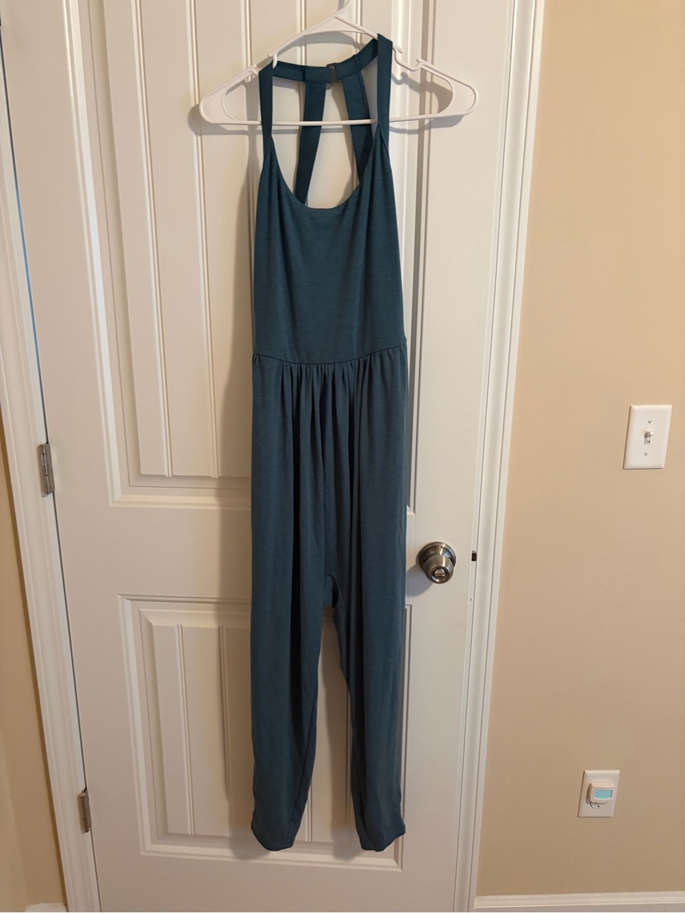 HALARA Teal Jumpsuit, open back, size tag missing but fits like a medium, NWOT